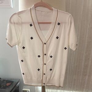 White Cardigan with Black Floral Accents